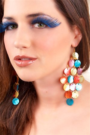 simsearch:400-04974367,k - Portrait of a beautiful young brunette woman with dramatic glamour make-up and fashionable earrings Photographie de stock - Aubaine LD & Abonnement, Code: 400-04598879