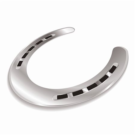 Silver horseshoe laying at an angle with a drop shadow Stock Photo - Budget Royalty-Free & Subscription, Code: 400-04599272