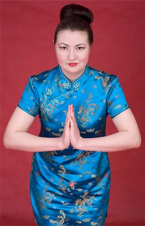 simsearch:400-05383537,k - Portrait japanese girl on the red background Stock Photo - Budget Royalty-Free & Subscription, Code: 400-04599468