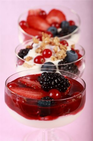 simsearch:400-04415230,k - Three yogurts in the glass with fruits and cereal Photographie de stock - Aubaine LD & Abonnement, Code: 400-04590344