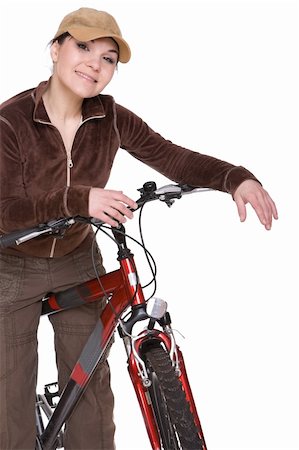 riding a bike funny pic - attractive brunette woman with bike. over white background Stock Photo - Budget Royalty-Free & Subscription, Code: 400-04591721