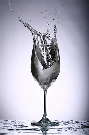 dry ice - alcohol splash on the gray background close up Stock Photo - Budget Royalty-Free & Subscription, Code: 400-04591873