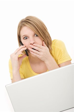 shocked teen computer - Caucasian teenager working on a laptop computer Stock Photo - Budget Royalty-Free & Subscription, Code: 400-04592481