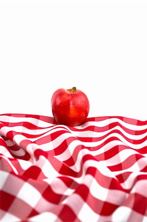 south12th (artist) - Red Gala Apple on Checkered Tablecloth on White Background Foto de stock - Super Valor sin royalties y Suscripción, Código: 400-04592982