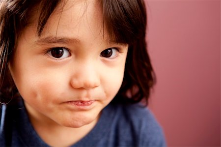 simsearch:400-05745991,k - A cute, mixed-race boy looking at camera. Foto de stock - Super Valor sin royalties y Suscripción, Código: 400-04593311