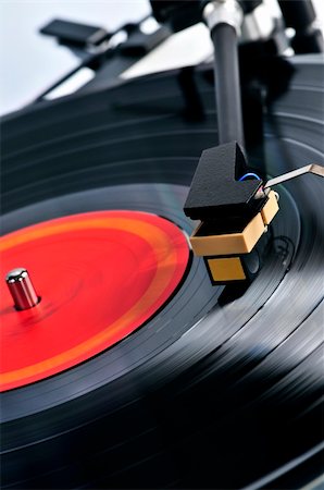 simsearch:853-03616784,k - Vinyl record spinning on turntable close up Photographie de stock - Aubaine LD & Abonnement, Code: 400-04604562
