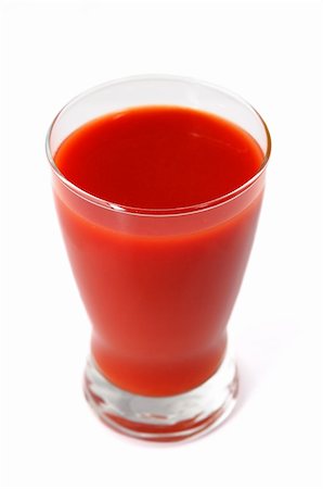 tomato juice on white background, shallow focus Stock Photo - Budget Royalty-Free & Subscription, Code: 400-04604637