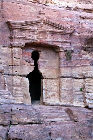 simsearch:400-05132743,k - Lion Tomb in Petra - Nabataeans capital city (Al Khazneh) , Jordan. Made by digging a holes in the rocks. Roman Empire period. Photographie de stock - Aubaine LD & Abonnement, Code: 400-04605103