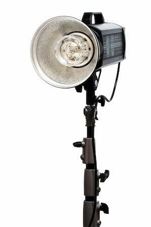 stage floodlight - Modern powerful photographic flash on a white background Stock Photo - Budget Royalty-Free & Subscription, Code: 400-04605116