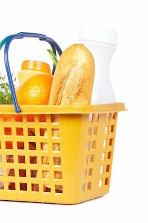 A shopping basket full of groceries isolated on white background Foto de stock - Super Valor sin royalties y Suscripción, Código: 400-04605857