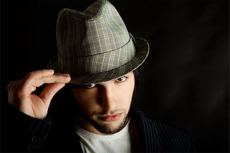 simsearch:400-07316542,k - Portrait of a young guy with a cool hat Stock Photo - Budget Royalty-Free & Subscription, Code: 400-04606321