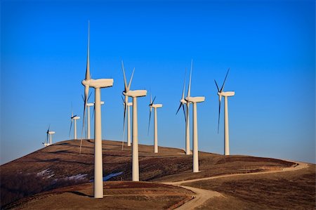 simsearch:400-03912255,k - Windmills turning on the sunset in summer. Motion blur Stock Photo - Budget Royalty-Free & Subscription, Code: 400-04606800
