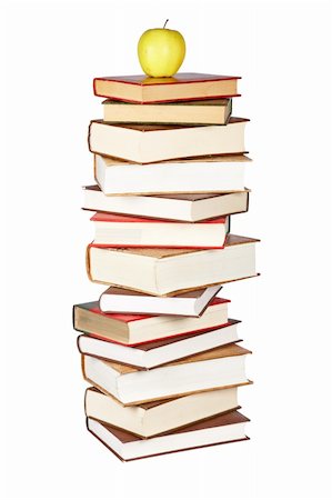 simsearch:400-04944793,k - Yellow apple on pile of books isolated on white background Photographie de stock - Aubaine LD & Abonnement, Code: 400-04607055