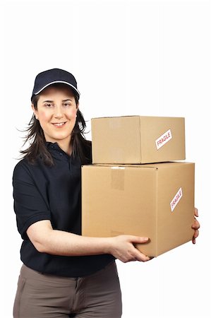 Courier woman delivering a parcels fragile isolated on white background Stockbilder - Microstock & Abonnement, Bildnummer: 400-04607051