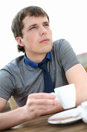 expresso bar - Young man drinks coffee. Stock Photo - Budget Royalty-Free & Subscription, Code: 400-04607189