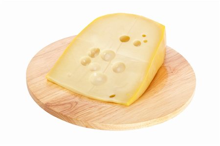 simsearch:400-04935152,k - Slice of fresh cheese on wooden dish isolated Stock Photo - Budget Royalty-Free & Subscription, Code: 400-04607538