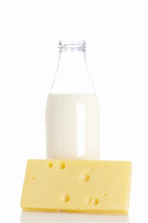 simsearch:400-04499805,k - Slice of fresh cheese and milk bottle isolated on white background Photographie de stock - Aubaine LD & Abonnement, Code: 400-04607540