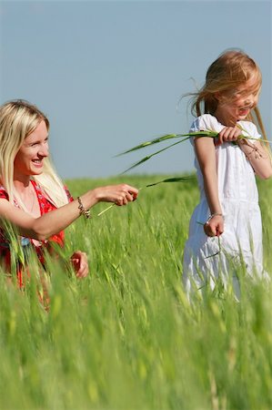 happy mother and daughter outdoors Stock Photo - Budget Royalty-Free & Subscription, Code: 400-04607671