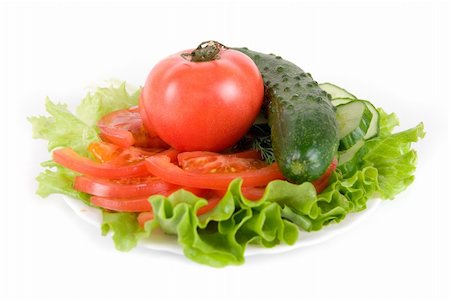 simsearch:400-04299967,k - Healthy combination of lettuce, tomato and cucumber on white Photographie de stock - Aubaine LD & Abonnement, Code: 400-04607816