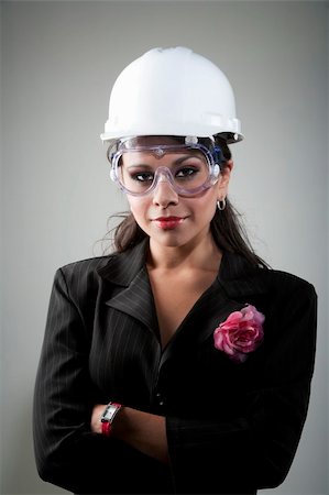 Handsome young woman in hard hat and safety goggles Stock Photo - Budget Royalty-Free & Subscription, Code: 400-04607981