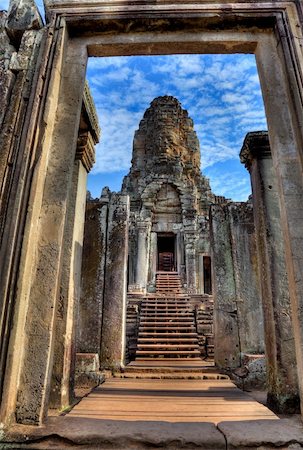 view through door entrance to a statue of bayon temple in angkor wat - Cambodia (HDR) Stock Photo - Budget Royalty-Free & Subscription, Code: 400-04608031