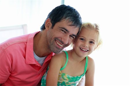 family beach house - Father and daughter together smiling at the camera Stock Photo - Budget Royalty-Free & Subscription, Code: 400-04608057