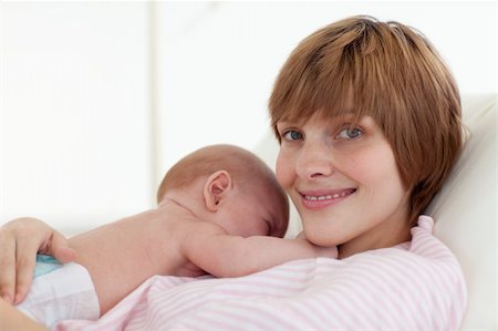 Mother embracing her newborn baby in the hospital Stock Photo - Budget Royalty-Free & Subscription, Code: 400-04608063