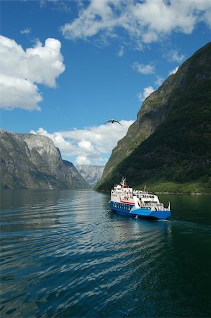 sognefjord - A magical tour on the Norway fjords, with high mountains all around us Foto de stock - Super Valor sin royalties y Suscripción, Código: 400-04608862