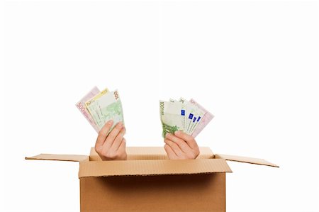 simsearch:695-05780265,k - Hands with money inside of a carboard box Photographie de stock - Aubaine LD & Abonnement, Code: 400-04608984