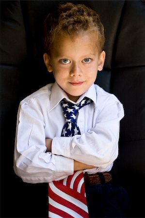 A portrait of young boy wearing US flag necktie Stock Photo - Budget Royalty-Free & Subscription, Code: 400-04609085