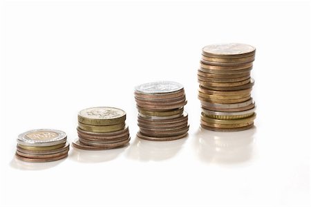 Stacks of coins isolated on white background Stock Photo - Budget Royalty-Free & Subscription, Code: 400-04609096