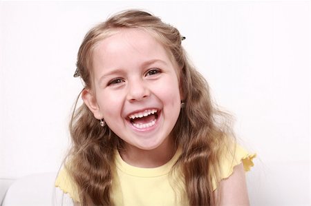 simsearch:400-04162652,k - Beautiful small girl is laughing  sincerely Stockbilder - Microstock & Abonnement, Bildnummer: 400-04609304