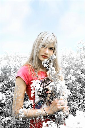 simsearch:400-04982004,k - blond girl in a field between flowers with desaturate color Stock Photo - Budget Royalty-Free & Subscription, Code: 400-04609369