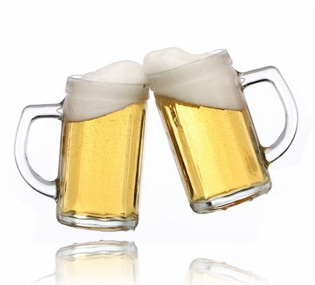 simsearch:841-03063177,k - Pair of beer glasses making a toast. Beer splash Photographie de stock - Aubaine LD & Abonnement, Code: 400-04609425