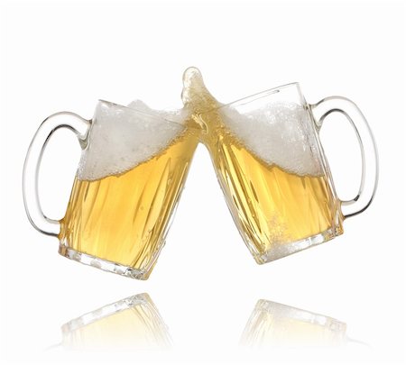 simsearch:841-03063177,k - Pair of beer glasses making a toast. Beer splash Photographie de stock - Aubaine LD & Abonnement, Code: 400-04609426