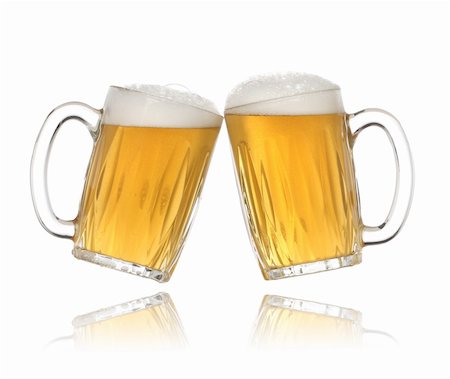 simsearch:841-03063177,k - Pair of beer glasses making a toast. Beer splash Photographie de stock - Aubaine LD & Abonnement, Code: 400-04609427