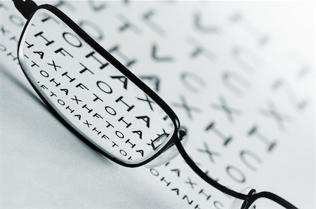 simsearch:400-08407302,k - Spectacles bringing an eye test chart into focus. Stock Photo - Budget Royalty-Free & Subscription, Code: 400-04609452