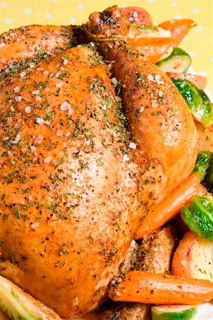 roasted carrots - Roasted chicken seasoned with herbs and garnished with potatoes, carrots, and brussels sprouts. Stock Photo - Budget Royalty-Free & Subscription, Code: 400-04609798