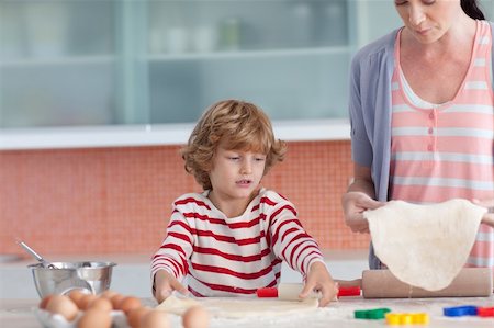 Young Mother with her son Baking in the Kitchen Stock Photo - Budget Royalty-Free & Subscription, Code: 400-04600075