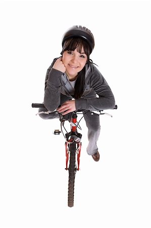 riding a bike funny pic - attractive brunette woman with bike. over white background Stock Photo - Budget Royalty-Free & Subscription, Code: 400-04600137