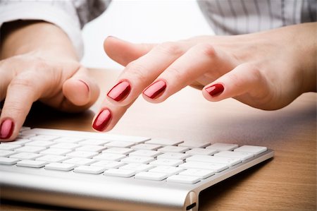 Fingers with red nail typing on keyboard Stock Photo - Budget Royalty-Free & Subscription, Code: 400-04600255