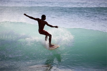 simsearch:400-04476949,k - Young men - the surfer in ocean. Bali. Indonesia Photographie de stock - Aubaine LD & Abonnement, Code: 400-04600493