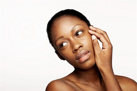 pedi - African woman with natural make-up headshoot Photographie de stock - Aubaine LD & Abonnement, Code: 400-04600584