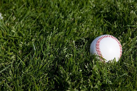 Baseball in long gren grass Stock Photo - Budget Royalty-Free & Subscription, Code: 400-04600592