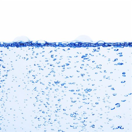 simsearch:400-04530350,k - Crisp, clean, blue water photographed against a white background. Stockbilder - Microstock & Abonnement, Bildnummer: 400-04600940