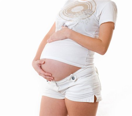 simsearch:400-05887749,k - Pregnant. Isolated on white background Stock Photo - Budget Royalty-Free & Subscription, Code: 400-04601354