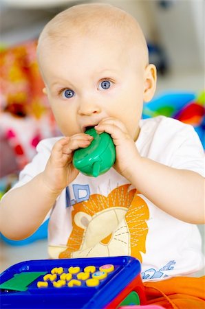 simsearch:400-04939110,k - Portrait of sweet little baby boy with toys Photographie de stock - Aubaine LD & Abonnement, Code: 400-04601630