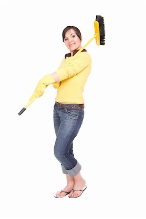 picture of a lady sweeping the floor - attractive brunette woman doing housework, over white background Stock Photo - Budget Royalty-Free & Subscription, Code: 400-04602128
