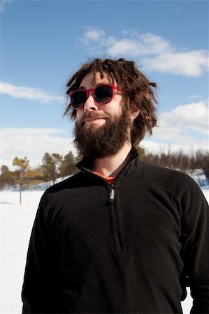 A funny portrait of a male with a full beard and sunglasses Stock Photo - Budget Royalty-Free & Subscription, Code: 400-04602888