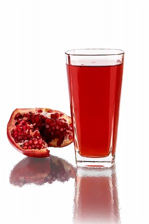 fresh half of pomegranate and juice Stock Photo - Budget Royalty-Free & Subscription, Code: 400-04603545